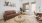 Large open living space with alot of natural light and wood floors